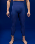 Male dancer wearing male dancewear navy blue tights