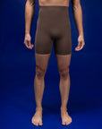 Male dancer wearing male dancewear brown chocolate bike shorts