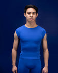 Male dancer wearing male dancewear royal blue tee