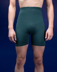 Male dancer wearing male dancewear forest green bike shorts